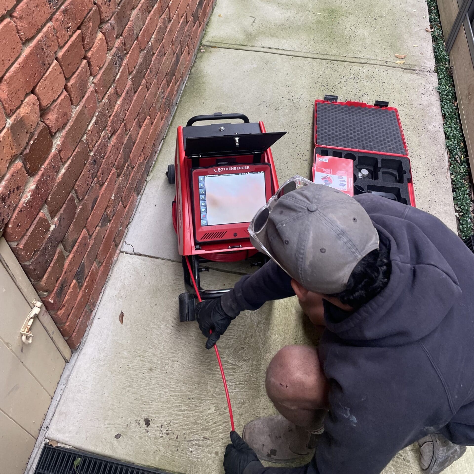 Experienced plumbing team with branded uniforms