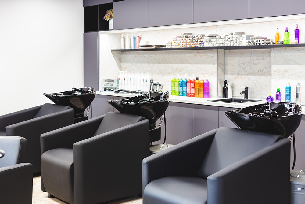 Beauty,Salon,Barbershop,Interior.,Large,Comfortable,Black,Leather,Armchairs,In